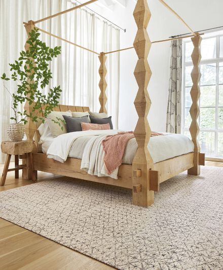 Bedroom with FLOR area rug Vintage Vibe shown in Cream